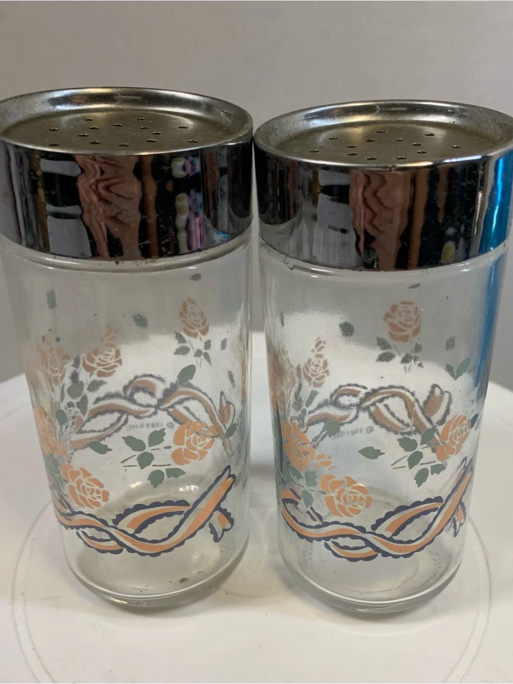 Vintage Ancho Hocking “Basket, Ribbons & Roses Salt & Pepper Shakers.       3801
